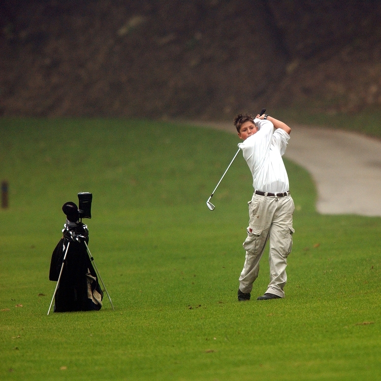Junior golfer playing a game of golf thanks to Youth on Course