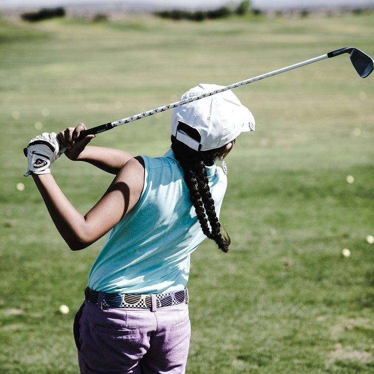 Junior golfer playing on an oregon golf course